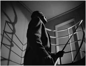 Film Noir scene from "Mildred Pierce" with hard lighting.