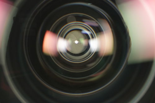 A close up of a lens with a closed aperature