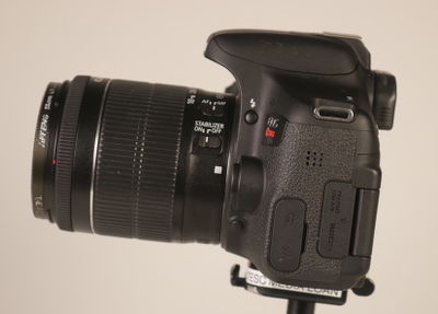 A Canon Rebel T6i camera from a side view.
